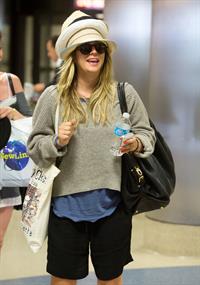 Kaley Cuoco at LAX on April 26, 2012
