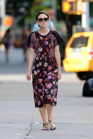 Keira Knightley wears a dark floral dress while strolling in New York City on August 7, 2012