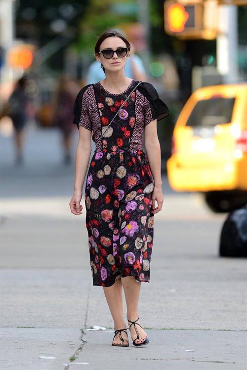 Keira Knightley wears a dark floral dress while strolling in New York City on August 7, 2012