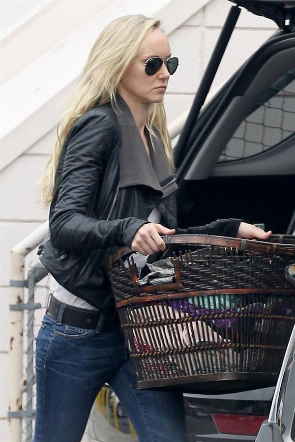 Kimberly Stewart Donating a trunk full of designer clothes at Wasteland in Los Angeles (November 15, 2012) 
