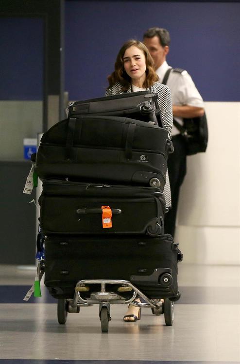 Lily Collins Pictures Lily Collins - LAX Airport 8/27/13