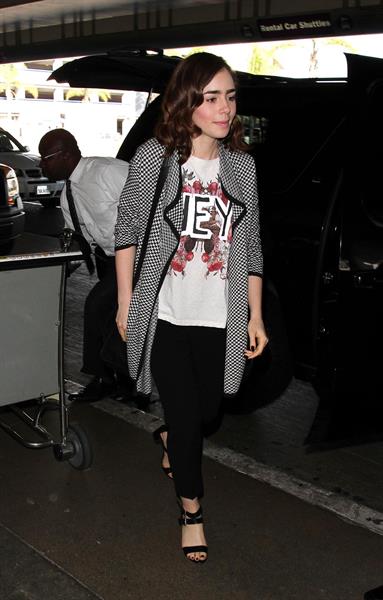 Lily Collins - LAX Airport 8/27/13