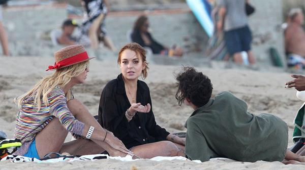 Lindsay Lohan - arriving to the beach in Malibu - August 12, 2012
