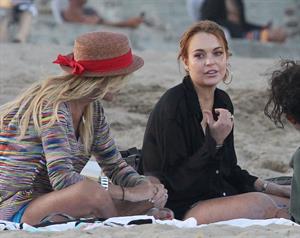 Lindsay Lohan - arriving to the beach in Malibu - August 12, 2012