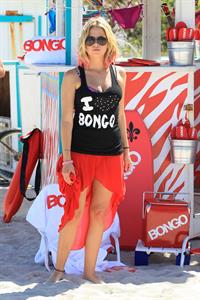 Lucy Hale and Ashley Benson photoshoot at the Bondo Bikini Shack on Miami Beach on March 24, 2012