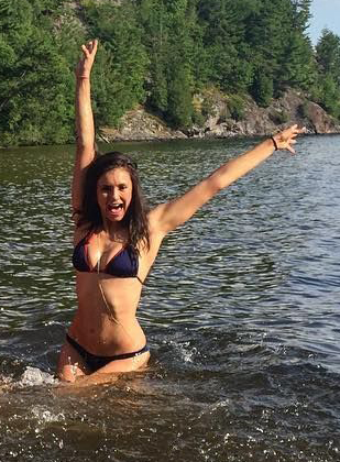 Nina Dobrev in a bikini