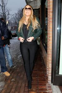 Mariah Carey made another stop at the Louis Vuitton store to shop with a family member. December 24, 2012 