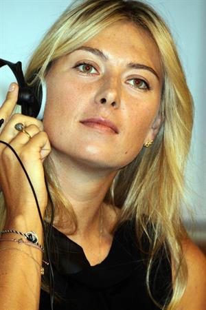 Maria Sharapova attends a press conference to present Saturday's exhibition match Milan November 30, 2012 