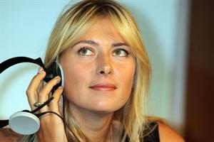 Maria Sharapova attends a press conference to present Saturday's exhibition match Milan November 30, 2012 