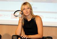 Maria Sharapova attends a press conference to present Saturday's exhibition match Milan November 30, 2012 