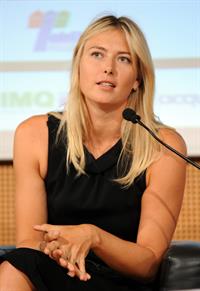 Maria Sharapova attends a press conference to present Saturday's exhibition match Milan November 30, 2012 