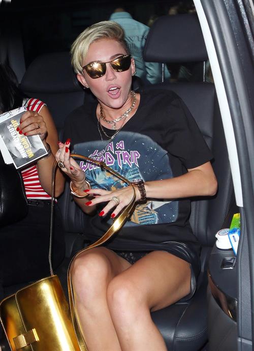 Miley Cyrus Spotted in a Join A Weird Trip T-shirt outside the London Studios in London (18.07.2013) 