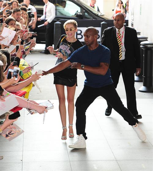 Miley Cyrus Spotted in a Join A Weird Trip T-shirt outside the London Studios in London (18.07.2013) 