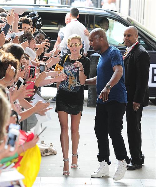 Miley Cyrus Spotted in a Join A Weird Trip T-shirt outside the London Studios in London (18.07.2013) 