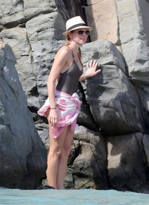 Naomi Watts wearing a swimsuit on the beach in St Barts 12/31/12 