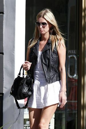 Nicky Hilton in a short white dress while shopping in Beverly Hills March 1, 2013 