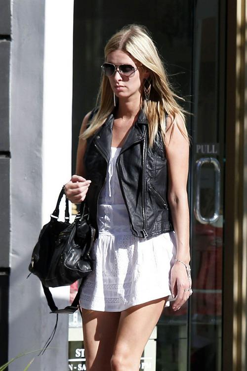 Nicky Hilton in a short white dress while shopping in Beverly Hills March 1, 2013 