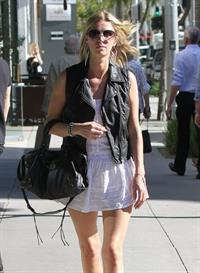 Nicky Hilton in a short white dress while shopping in Beverly Hills March 1, 2013 
