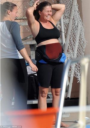 Nicole Eggert prepares for 'Splash' (sports bra/wetsuit) 6.2.2013 