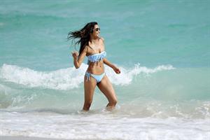 Padma Lakshmi in a bikini on the beach in Miami, Florida - December 8, 2012 