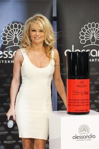 Pamela Anderson  Presents Striplac Nail Polish at Beauty Fair Düsseldorf  March 15, 2013 