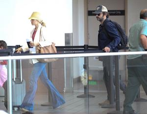 Rachel McAdams - Departs on a flight at LAX airport - August 9, 2012