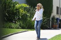 Rachel McAdams throws out the trash in Beverly Hills August 3, 2012