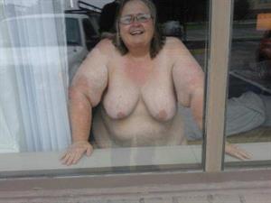 Showing myself in a hotel room in front of an open window