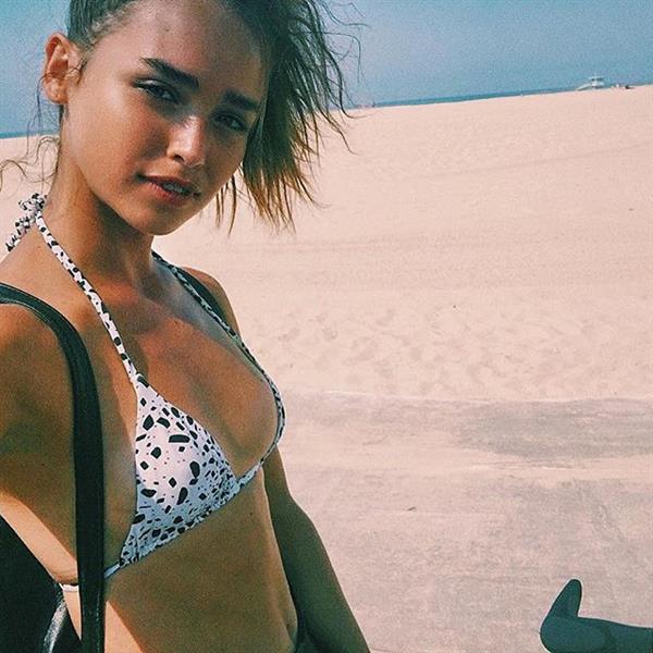 Carolina Sanchez in a bikini taking a selfie