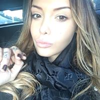 Nabilla Benattia taking a selfie