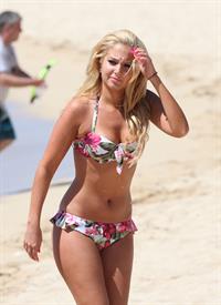 Tulisa Contostavlos in a bikini on the beach in Honolulu July 31, 2012