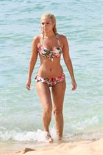 Tulisa Contostavlos in a bikini on the beach in Honolulu July 31, 2012