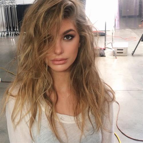 Camila Morrone taking a selfie