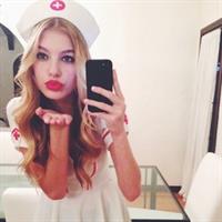 Camila Morrone taking a selfie