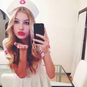 Camila Morrone taking a selfie