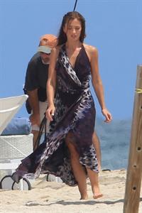 Minka Kelly on the set of Charlie's Angels on a beach in Miami 02-09-2011