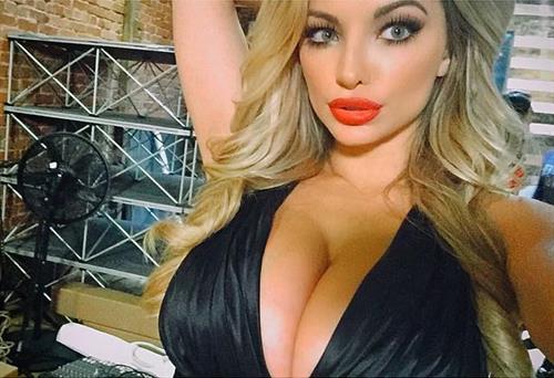 Lindsey Pelas in a bikini taking a selfie