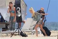 Minka Kelly and Rachael Taylor film Charlie's Angels on a beach in Miami 02-09-11