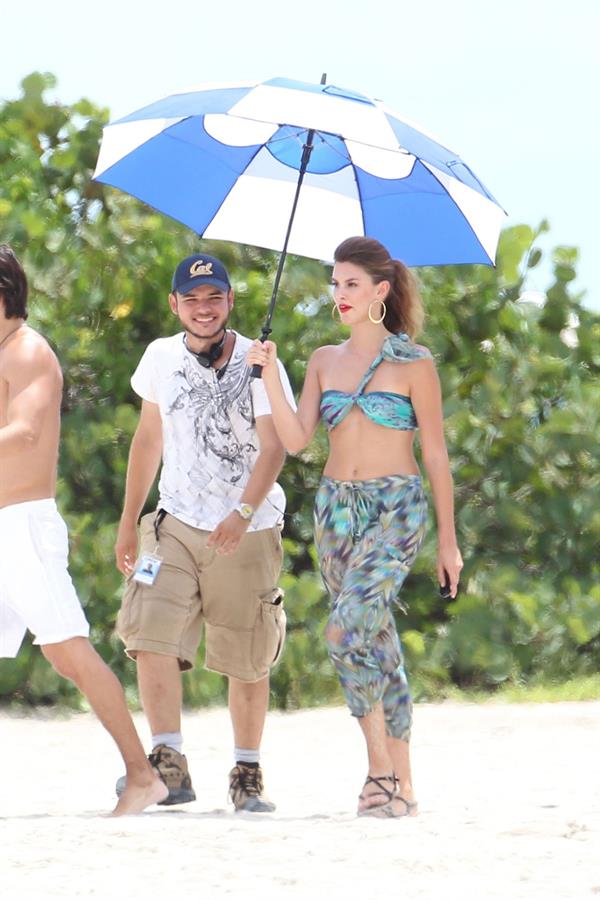 Minka Kelly filming Charlie's Angels on a beach in Miami 02-09-11
