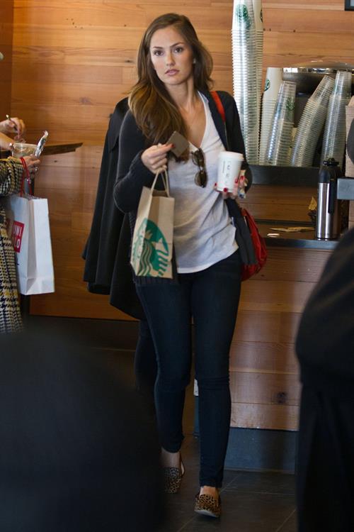 Minka Kelly outside her hotel with her morning Starbucks in New York City 8/2/2012 