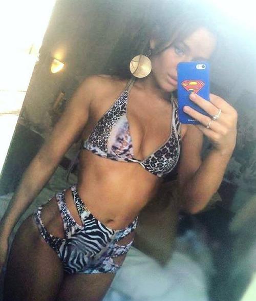 Rosie Mac in a bikini taking a selfie