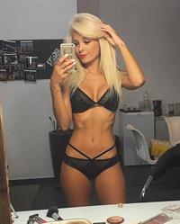 Jhenny Andrade in a bikini taking a selfie