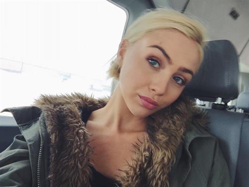 Taylor Godfrey taking a selfie