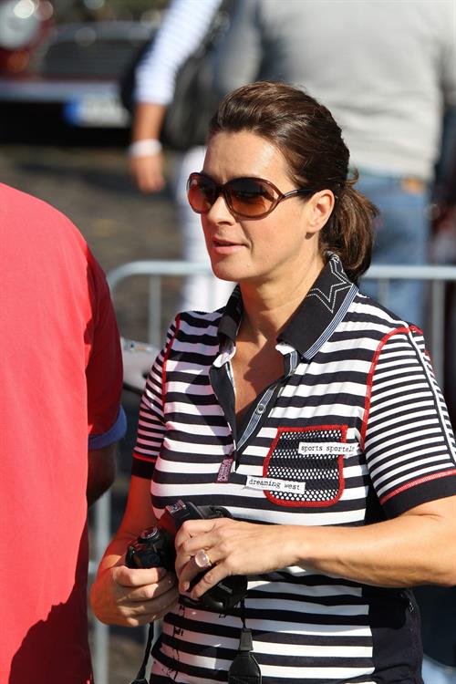 Katarina Witt at the oldtimer car rally Hamburg-Berlin-Klassik August 30, 2014