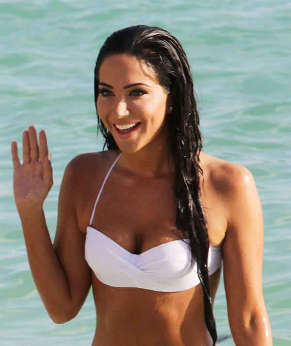 Tulisa Contostavlos in a bikini on the beach in Bermuda August 21, 2014