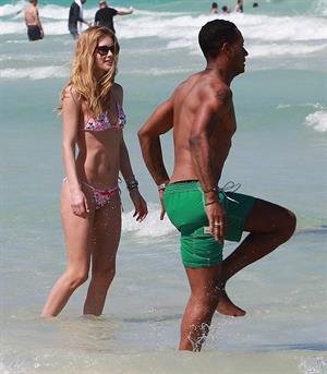 Doutzen Kroes enjoys a day on the beach in Miami Beach, FL on April 28, 2013