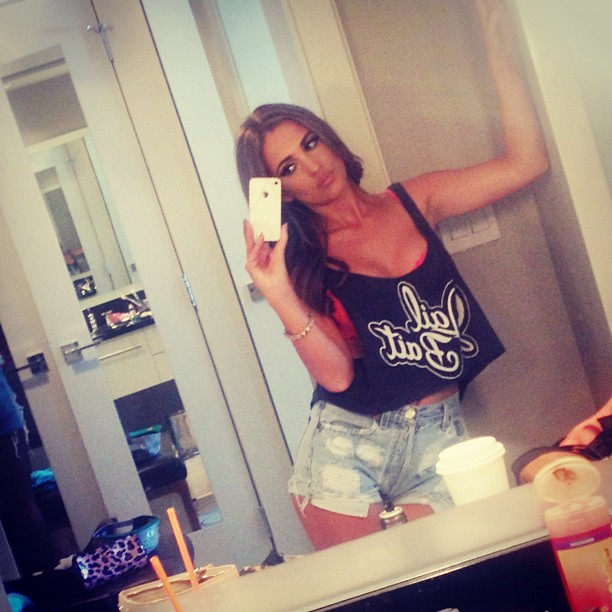 Arielle Reitsma in a bikini taking a selfie