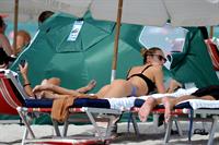 Candice Swanepoel in a bikini - ass