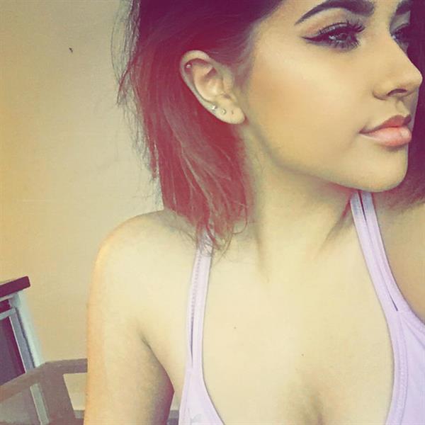 Becky G taking a selfie