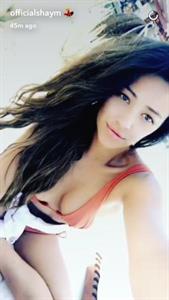 Shay Mitchell taking a selfie
